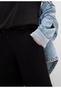 bonprix - Spodnie z dżerseju z lejącej mieszanki wiskozy. Kolor: czarny. Materiał: wiskoza, jersey #3