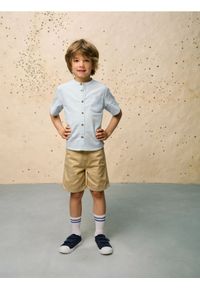 Sinsay - Szorty jeansowe z podwijanymi nogawkami - beżowy. Kolor: beżowy. Materiał: jeans