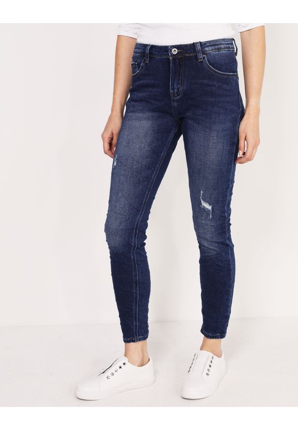 Unisono - SPODNIE - JEANSY. Okazja: na co dzień. Materiał: jeans. Styl: casual, klasyczny