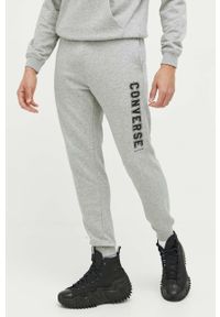 Converse spodnie dresowe kolor szary z nadrukiem. Kolor: szary. Materiał: dresówka. Wzór: nadruk #3