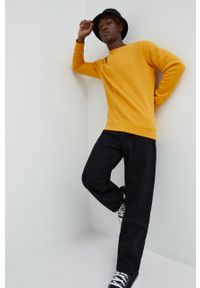 Superdry bluza męska kolor żółty gładka. Kolor: żółty. Materiał: dzianina. Wzór: gładki