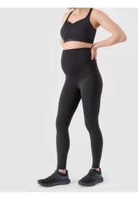 4f - Legginsy ciążowe treningowe szybkoschnące damskie - czarne. Stan: podwyższony. Kolekcja: moda ciążowa. Kolor: czarny. Materiał: syntetyk, elastan, materiał, włókno, dzianina. Długość: do kostek. Wzór: ze splotem, jednolity, gładki. Sport: fitness