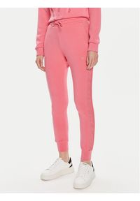 Guess Spodnie dresowe V2YB18 K7UW2 Różowy Regular Fit. Kolor: różowy. Materiał: wiskoza