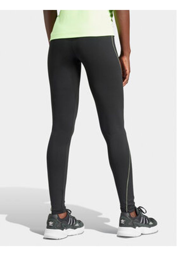 Adidas - adidas Legginsy Graphic IT9700 Czarny Slim Fit. Kolor: czarny. Materiał: syntetyk