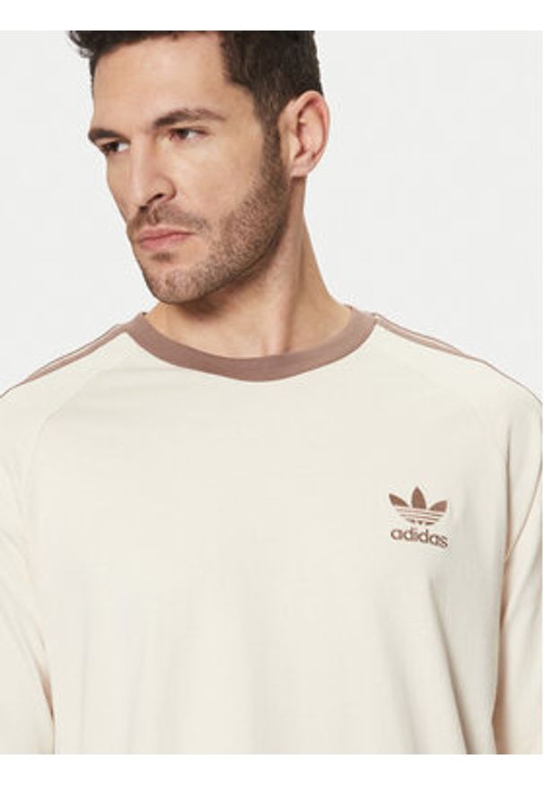 Adidas - adidas Longsleeve adicolor Classics 3-Stripes JN7022 Écru Slim Fit. Materiał: bawełna. Długość rękawa: długi rękaw