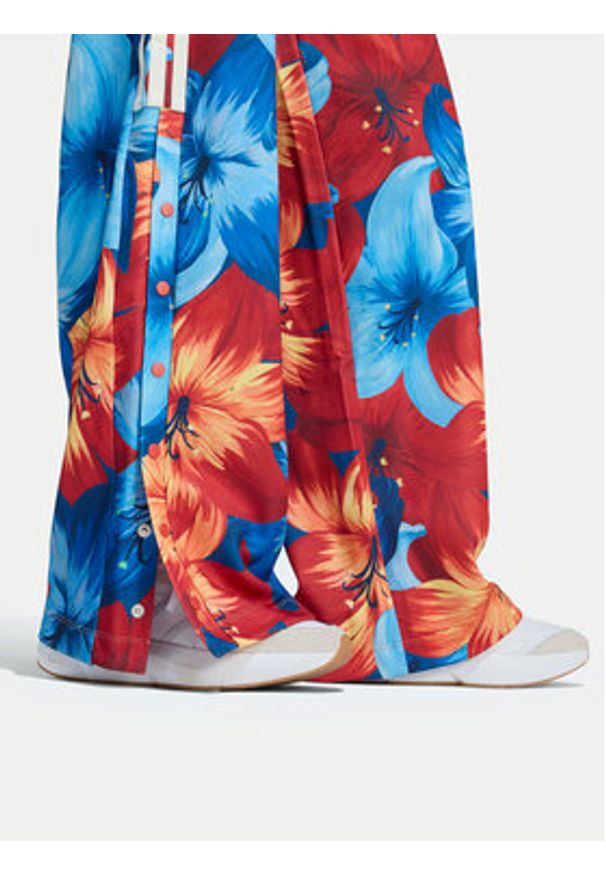 Adidas - adidas Spodnie dresowe Farm Rio House Of Tiro KD4633 Niebieski Loose Fit. Kolor: niebieski. Materiał: syntetyk