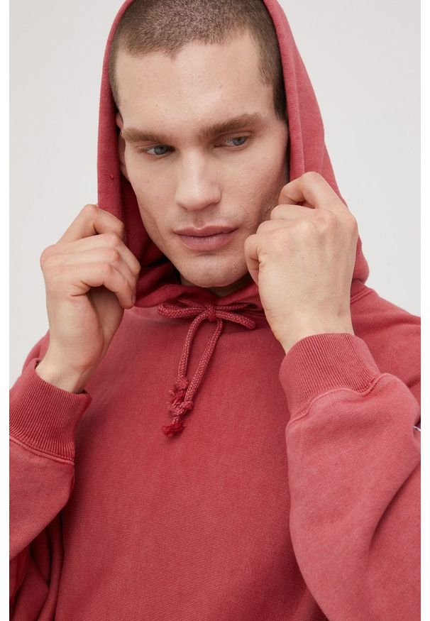 Champion bluza 217240 męska kolor różowy z kapturem gładka. Typ kołnierza: kaptur. Kolor: różowy. Wzór: gładki
