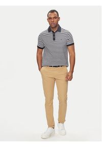 TOMMY HILFIGER - Tommy Hilfiger Chinosy Bleecker MW0MW26619 Beżowy Slim Fit. Kolor: beżowy. Materiał: bawełna