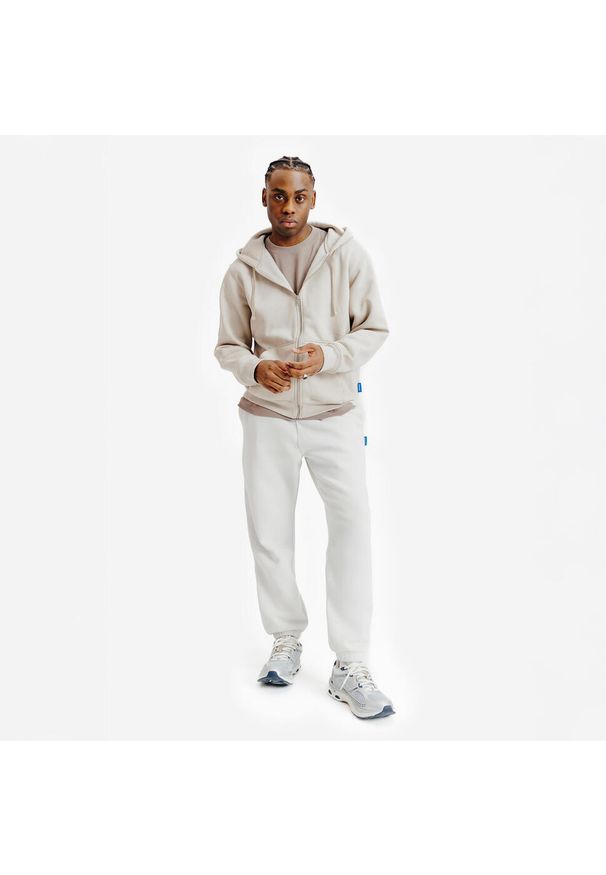 Decathlon - Bluza na suwak unisex Elementals. Typ kołnierza: kaptur. Kolor: beżowy. Materiał: tkanina, elastan, prążkowany, bawełna, materiał, poliester