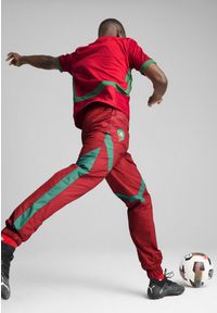 Puma - Męskie tkane spodnie przedmeczowe Maroko PUMA Intense Red Archive Green. Kolor: czerwony, wielokolorowy, zielony