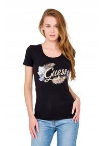 Guess - GUESS Damski czarny t-shirt ze zdobionym logo. Kolor: czarny. Wzór: aplikacja
