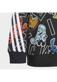 Adidas - Bluza dziecięca adidas Disney Mickey Mouse. Kolor: żółty, wielokolorowy, czarny, biały. Wzór: motyw z bajki