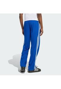 Adidas - adidas Spodnie dresowe adicolor Firebird KD4079 Niebieski Regular Fit. Kolor: niebieski. Materiał: syntetyk #4
