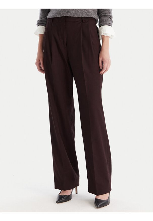 TOMMY HILFIGER - Tommy Hilfiger Spodnie materiałowe WW0WW48358 Bordowy Relaxed Fit. Kolor: czerwony. Materiał: wiskoza