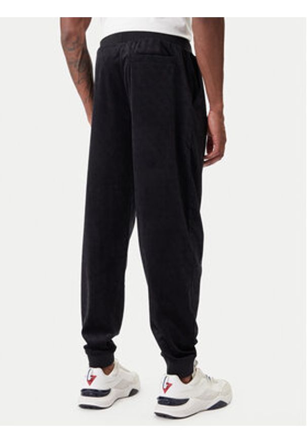 Guess Spodnie dresowe Z6RB14 KD612 Czarny Regular Fit. Kolor: czarny. Materiał: syntetyk