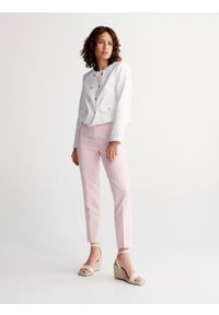 Reserved - Spodnie z kantem - pastelowy róż. Kolor: różowy. Materiał: tkanina, wiskoza. Wzór: gładki