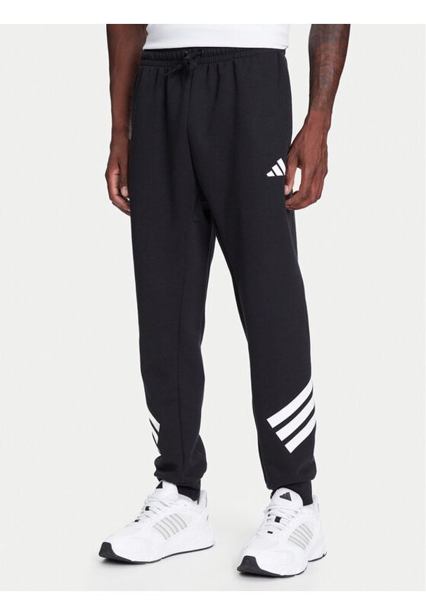 Adidas - adidas Spodnie dresowe Future Icons 3-Stripes JD4863 Czarny Regular Fit. Kolor: czarny. Materiał: syntetyk, bawełna