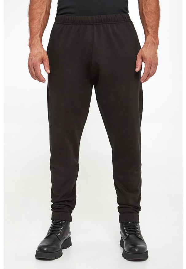 Kenzo - Spodnie dresowe męskie KENZO. Materiał: dresówka
