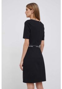 Calvin Klein Sukienka kolor czarny mini rozkloszowana. Kolor: czarny. Materiał: włókno, dzianina. Długość rękawa: krótki rękaw. Wzór: aplikacja. Typ sukienki: rozkloszowane. Długość: mini #4