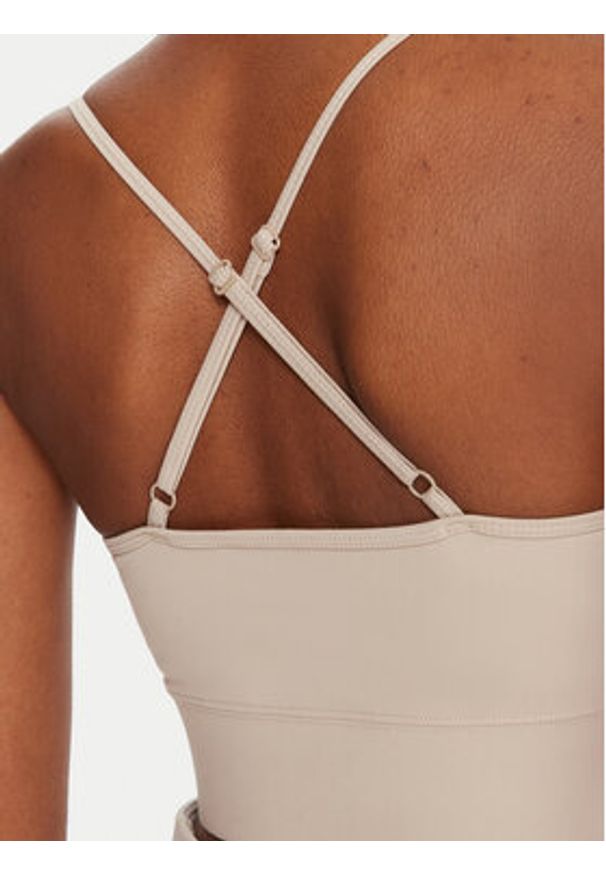 Reebok Biustonosz sportowy Reebok X Ewa Chodakowska RK25310CCW Beżowy. Kolor: beżowy. Materiał: syntetyk