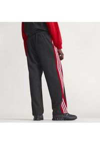 Adidas - adidas Spodnie dresowe KE0117 Czarny Loose Fit. Kolor: czarny. Materiał: syntetyk #3