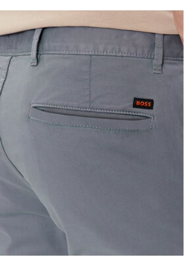 BOSS - Boss Chinosy 50510933 Niebieski Slim Fit. Kolor: niebieski. Materiał: bawełna