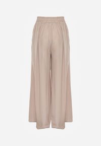 Renee - Beżowe Szerokie Spodnie z Gumką w Talii Carleny. Kolor: beżowy. Materiał: wiskoza, tkanina #3
