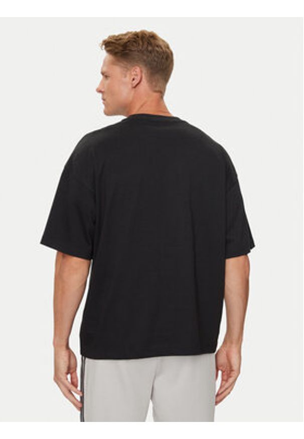 Adidas - adidas T-Shirt City Escape JF3704 Czarny Loose Fit. Kolor: czarny. Materiał: bawełna