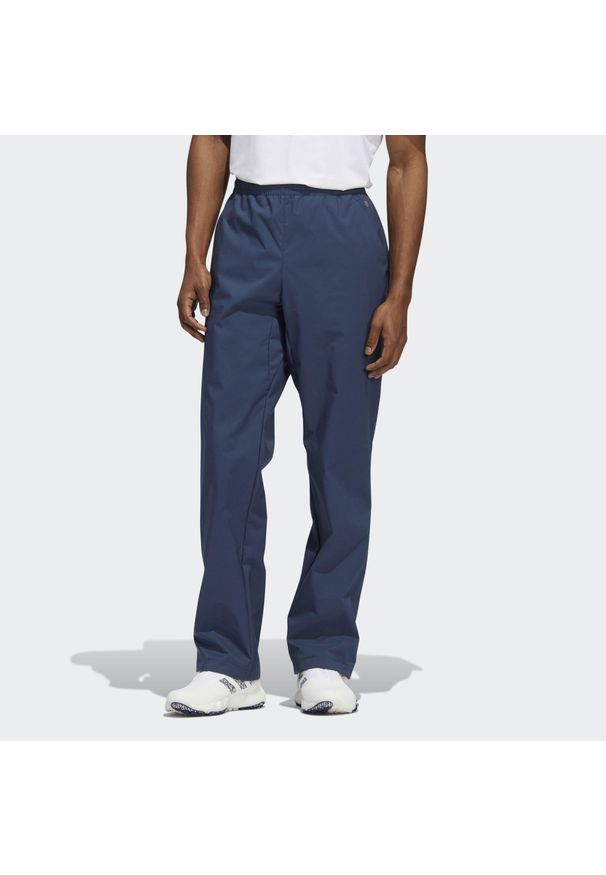 Adidas - Spodnie Provisional Golf. Kolor: niebieski. Materiał: materiał. Sport: golf