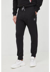 Armani Exchange spodnie dresowe bawełniane męskie kolor czarny gładkie. Kolor: czarny. Materiał: bawełna, dresówka. Wzór: gładki