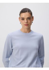 Reserved - Sweter z wełny merino - jasnoniebieski. Kolor: niebieski. Materiał: wełna