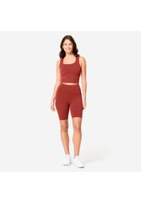 Decathlon - Legginsy krótkie fitness damskie Domyos. Kolor: czerwony, brązowy, wielokolorowy. Materiał: poliamid, elastan, materiał. Długość: krótkie. Sport: fitness