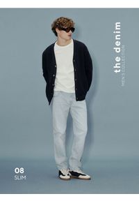 Reserved - Jeansy slim z efektem sprania - niebieski. Kolor: niebieski