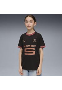 Puma - Młodzieżowa trzecia koszulka Stade Rennais F.C. 25/26 PUMA Black Copper Metallic. Kolor: czarny, szary, wielokolorowy. Sport: piłka nożna
