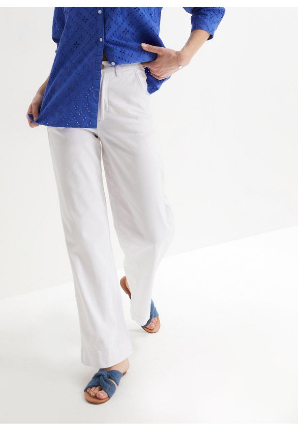 bonprix - Dżinsy ze stretchem Wide Fit. Kolor: biały