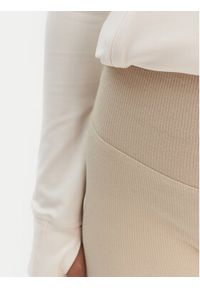 Adidas - adidas Legginsy Essentials KD3850 Beżowy Flared Leg. Kolor: beżowy. Materiał: wiskoza #3