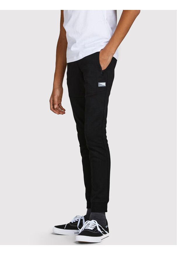 Jack&Jones Junior Spodnie dresowe Will 12189809 Czarny Regular Fit. Kolor: czarny. Materiał: syntetyk