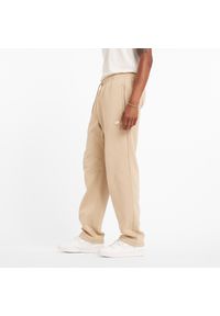 Spodnie męskie New Balance MP44587SNW – beżowe. Kolor: beżowy. Materiał: poliester, bawełna #5