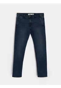 Sinsay - Spodnie jeansowe chino slim fit - niebieski. Kolor: niebieski. Materiał: jeans