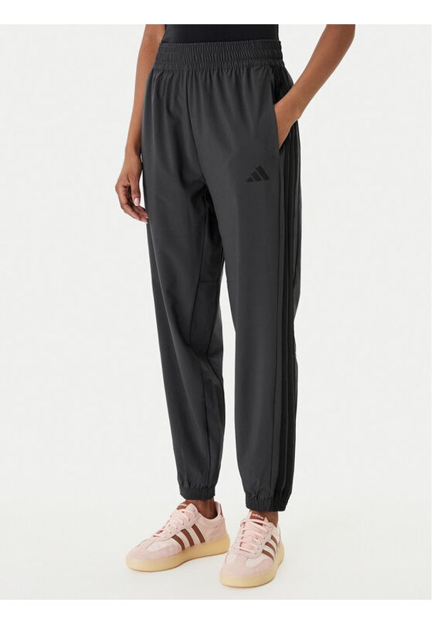 Adidas - adidas Spodnie dresowe Train Essentials 3-Stripes Woven KC5496 Czarny Regular Fit. Kolor: czarny. Materiał: syntetyk