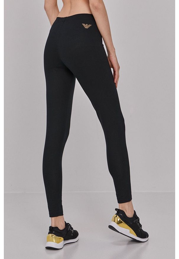 EA7 Emporio Armani Legginsy damskie kolor czarny z aplikacją. Kolor: czarny. Materiał: dzianina. Wzór: aplikacja