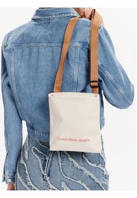 Calvin Klein Jeans Saszetka Sport Essentials Flatpack S Tt K50K508887 Beżowy. Kolor: beżowy. Materiał: materiał #5