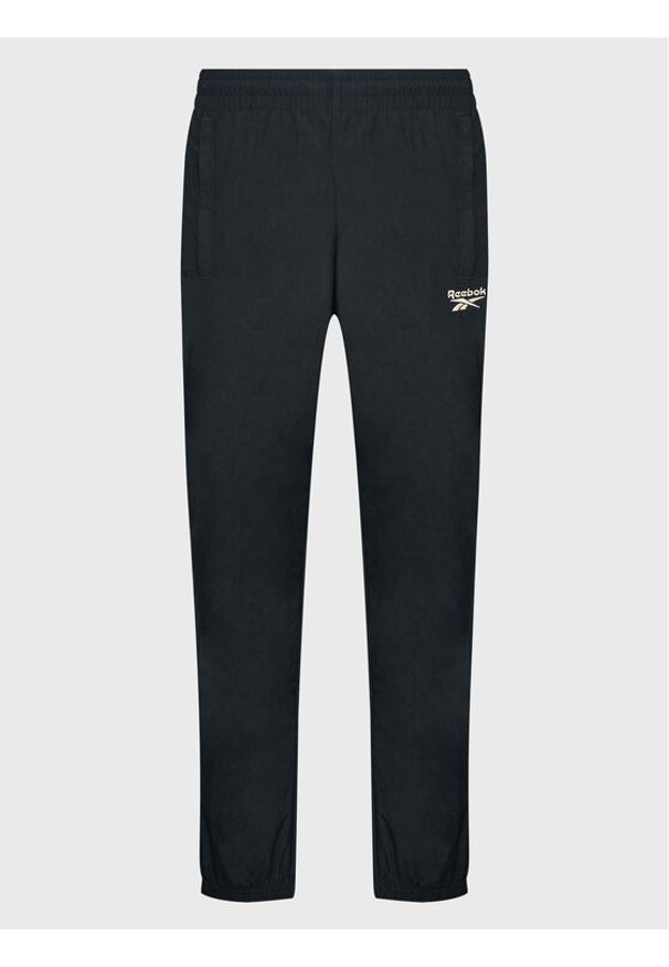 Reebok Spodnie dresowe Vector HK7077 Czarny Slim Fit. Kolor: czarny. Materiał: syntetyk