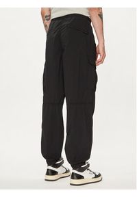 GAP - Gap Spodnie materiałowe 487058-00 Czarny Relaxed Fit. Kolor: czarny. Materiał: syntetyk