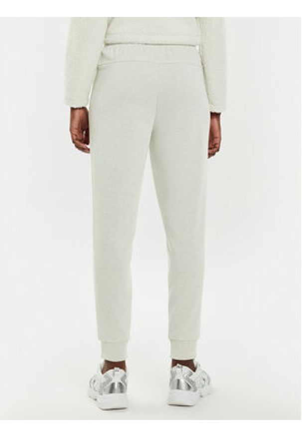 Calvin Klein Performance Spodnie dresowe 00GWS4P651 Beżowy Relaxed Fit. Kolor: beżowy. Materiał: syntetyk