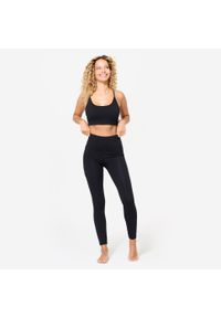 Decathlon - Stanik sportowy Domyos prążkowany. Kolor: czarny. Materiał: prążkowany. Sport: joga i pilates, fitness