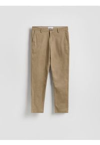 Reserved - Spodnie chino slim fit - beżowy. Kolor: beżowy. Materiał: tkanina, bawełna