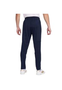 Nike - Męskie Dzianinowe Spodnie Do Biegania Park 20. Kolor: niebieski. Materiał: dzianina