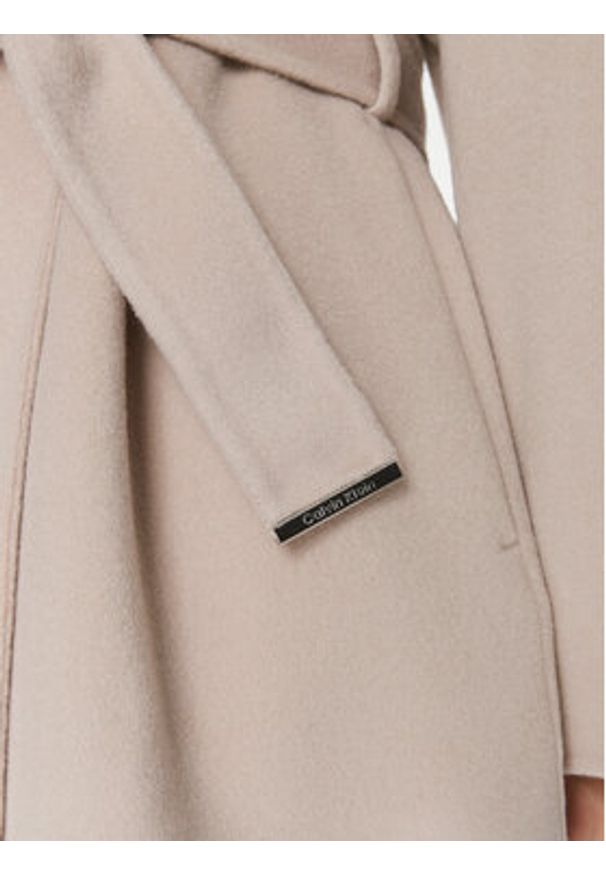 Calvin Klein Płaszcz wełniany K20K206746 Beżowy Relaxed Fit. Kolor: beżowy. Materiał: wełna