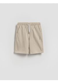 Reserved - Bawełniane szorty - beżowy. Kolor: beżowy. Materiał: bawełna